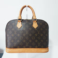 Louis Vuitton Alma Monogram marrón